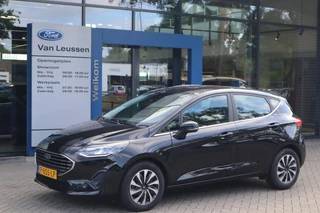 Ford Fiesta 125PK HYBRID TITANIUM APPLE/ANDROID PARK-SENSOREN CLIMA CRUISE NAVI LED DRAADLOOS-LADEN-TEL