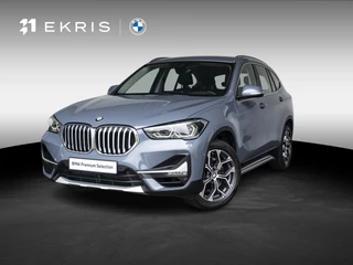 BMW X1 sDrive20i | High Executive | Orange Edition | Achteruitrijcamera | 18 inch | Elektrische achterklep | Navi Plus | Head-Up Display | Trekhaak