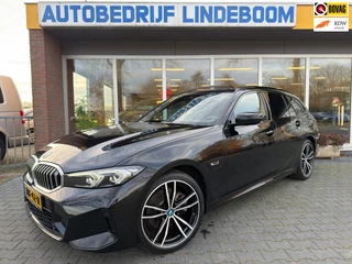 Hoofdafbeelding BMW 3 Serie BMW 3-serie Touring LCI Panoramadak M-Sport Widescreen HUD Memory Seat