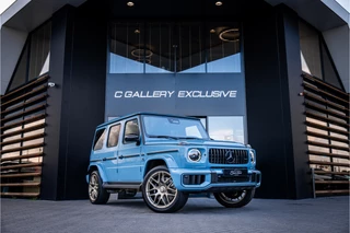 Hoofdafbeelding Mercedes-Benz G-Klasse Mercedes-Benz G-Klasse AMG G63 Facelift - Carbon Pakket | Manufaktur China Blue | Panorama | Nappa leder