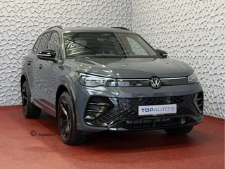 Volkswagen Tiguan 1.5 eHYBRID 272PK NW AUTO R-LINE PANO XL.NAVI BLACK.STYLE 360.CAM ELEK.KLEP MATRIX.LED 20''LMV MASSAGE PHEV PLUG IN HYBRID "Volkswagen rijden begint bij Topautos.nl – 75 topmodellen direct op voorraad!"