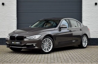 BMW 3-serie 328i High Executive | Camera | H&K | Xenon |
