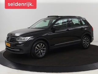 Hoofdafbeelding Volkswagen Tiguan Volkswagen Tiguan 1.4 TSI eHybrid R-Line Business | Panoramadak | Trekhaak | Stoelverwarming | head-up display | Carplay | Cruise Control Adaptief | LMV 17 |