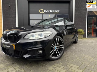 Hoofdafbeelding BMW 2 Serie BMW 2-serie Coupé 230i High Executive, M Sport, Schuif- en kanteldak, Stoelverwarming, Elektrisch verstelbare zetels, H/K