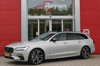 Hoofdafbeelding Volvo V90 Volvo V90 B5 250PK ULTIMATE DARK MILD HYBRID | PANORAMISCH SCHUIF/KANTEL DAK | HARMAN KARDON PREMIUM AUDIO | FULL-LED ACTIVE HIGH BEAM KOPLAMPEN | LED MISTLAMPEN VOOR | POWER SEATS - BESTUURDERS- EN PASSAGIERSSTOEL ELEKTRISCHVERSTELBAAR MET GEHEUGEN, ELEKTRISCH VERSTELBARE  ZITVERLENGERS /LENDESTEUN VIERVOUDIG VERSTELBAAR | SPORTSTOELEN MET NAPPA LEER | STOEL/STUUR VERWARMING | ORREFORS KRISTALLEN POOKKNOP | ZWARTE HEMELBEKLEDING | EXTRA GETINT GLAS ACHTER | ACHTERUITRIJ CAMERA | UITKLAPBARE ZITVERHOGERS ACHTERBANK | 20" BLACK DIAMONT VELGEN | PARKEER VERWARMING MET TIMER "STANDKACHEL" | NAVIGATIE VIA GOOGLE | APPLE CARPLAY/ANDROID AUTO | PARKEERSENSOREN VOOR EN ACHTER | ELEKTRISCH BEDIENBARE ACHTERKLEP | KEYLESS ENTRY + START | DODEHOEK DETECTIE | DRAADLOZE TELEFOONLADER | ADAPTIVE CRUISE CONTROL |