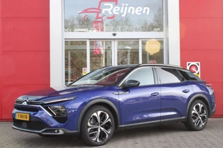 Citroen C5 X 1.6 Plug-in 225PK Hybrid SHINE | NAVIGATIE | HEAD UP DISPLAY | ELEKTRISCH BEDIENBARE VOORSTOELEN MET GEHEUGENFUNCTIE | MASSAGE STOELEN | LEDEREN BEKLEDING | VOORSTOELEN VERWARMD | VOORSTOELEN GEVENTILEERD | STUUR VERWARMING | KEYLESS ENTRY/START | ACHTERUITRIJ CAMERA | AFNEEMBARE TREKHAAK | DODEHOEK DETECTIE | DRAADLOZE TELEFOONLADER | DRAADLOZE APPLE CARPLAY/ANDROID AUTO | ADAPTIVE CRUISE CONTROL | VERWARMBARE VOORRUIT | DAKRAILS |