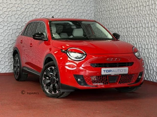 Fiat 600 1.2 HYBRID LA PRIMA CAMERA CARPLAY ADAP.CRUISE STOELVERW. ELEK.KLEP LEER MASSAGE ELEK.STOEL 18''LMV ✅ Top Auto Fiat Wijchen , 30 Jaar ervaring in Fiat , Wij leveren de : Icon / La Prima / Pop / Sport . Urban / Benzine / Hybrid . Met Fabrieksgarantie ✅  