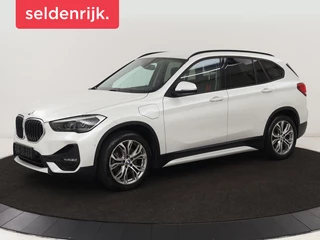 Hoofdafbeelding BMW X1 BMW X1 xDrive25e Sport Line | Stoelverwarming | Camera | Full LED | Sportstoelen | Keyless | Navigatie | Climate control | Parkeerhulp | Cruise control | DAB | Bluetooth
