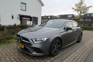 Mercedes A-klasse 180 AMG|SFEERVERLICHTING|ADAPTIVE CRUISE|BI COLOR BEKLEDING|NAVIGATIE