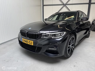 BMW 3-serie Touring 330e High Exe. M-Sport, Schuifdak