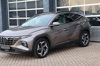 Hoofdafbeelding Hyundai Tucson Hyundai Tucson 1.6 T-GDI MHEV 150 pk navigatie,camera, Leder