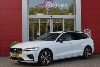 Volvo V60 2.0 T6 340PK RECHARGE AWD R-DESIGN **NIEUWSTAAT!** | ELEKTRISCH BEDIENBARE VOORSTOELEN MET GEHEUGEN OP BESTUURDERSSTOEL | 18" 5-Y SPAAKS MATT BLACK / DIAMOND CUT R-DESIGN WIELEN | HIGH PERFORMANCE SOUND HARMAN KARDON | ADAPTIVE CRUISE CONTROL | ACHTERUITRIJ CAMERA | GETINTE RUITEN | PARKEERSENSOREN VOOR EN ACHTER | STOEL/STUUR VERWARMING | BEKLEDING R-DESIGN NAPPA LEDER / TEXTIEL CHARCOAL IN COMBINATIE MET SPORTSTOELEN | KEYLESS ENTRY/START | ELEKTRISCH BEDIENBARE ACHTERKLEP |