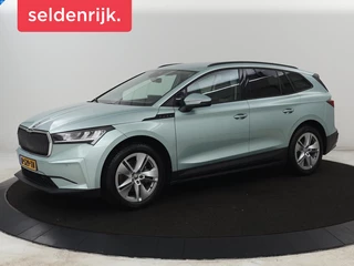 Skoda Enyaq iV 60 | SOH 91% | Trekhaak | Stoelverwarming | Camera | Sportstuur | Carplay | Navigatie | Cruise control | Full LED | Half leder | DAB | Parkeerhulp | Sfeerverlichting | Climate control