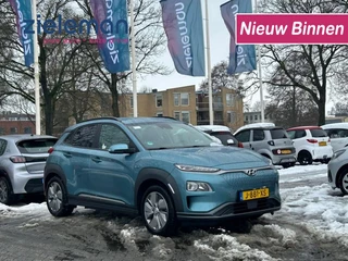 Hoofdafbeelding Hyundai Kona Hyundai Kona Electric EV Fashion 64 kWh - stoelverw. camera, half leer, headup display