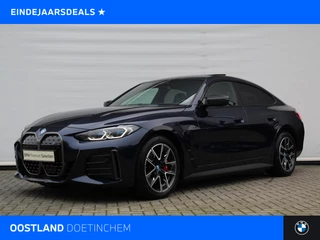 BMW i4 M50 High Executive / Schuif-kanteldak / Trekhaak / M Sportstoelen / Laserlight / Adaptief M Onderstel / Comfort Access / Parking Assistant Plus / Harman Kardon / Stoelverwarming