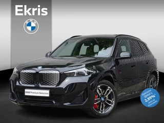 BMW iX1 eDrive20 M Sportpakket Pro | Travel Pack | 19 inch LM M Dubbelspaak (Styling 871 M) | Trekhaak met elektrisch wegklapbare kogel | Glazen panoramadak | Driving Assistant Plus