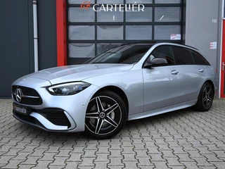 Mercedes C-klasse Estate 300 e AMG Line 313PK | Pano | Luchtvering | Air-Balance | MBUX | Burmester | Night Pakket | Ambient+ | Laser Led | Massage | Stoelventilatie & Verwarming  | Stuurwielverwarming  | Head-Up | Trekhaak | Cruise | Camera | Keyless