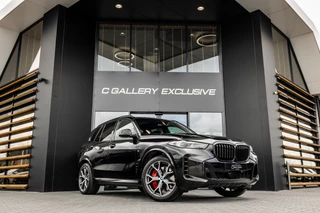 BMW X5 xDrive50e - M Sport Pro | Skylounge | B&W | Kuipstoelen | Luchtvering