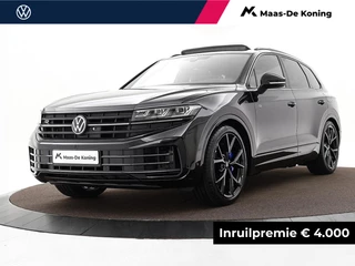 Hoofdafbeelding Volkswagen Touareg Volkswagen Touareg R Edition 3.0 eHybrid 462 PK 8 versn. DSG · Nachtzichtassistent · Comfort Pakket · Trekhaak inklapbaar, met elektrische ont grendeling, incl. aanhangwagenmanoeuvreerhulp 'Trailer Assist' · Zijruiten achter en achterruit getint, 82% lichtabsorberend en geluidsisolerend ·