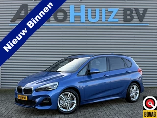 Hoofdafbeelding BMW 2 Serie BMW 2 Serie Active Tourer 220i High Executive M Sport Trekhaak Achteruitrijcamera Stoelverwarming LED