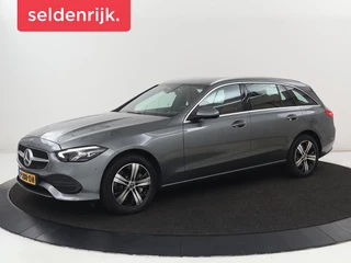 Mercedes-Benz C-klasse 300e Luxury Line | SOH 92% | Leder | Trekhaak |  Stoelverwarming | Sfeerverlichting | Carplay | Full LED | Navigatie | Camera | Park Assist | Dodehoek detectie | PHEV | Plug In