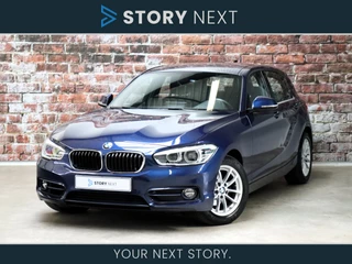 Hoofdafbeelding BMW 1 Serie BMW 1 Serie 118i Executive Sportline Automaat 5 deurs / Navigatie Professional / DAB / Parkeersensoren voor+achter / LED / 16 Inch / Hifi / Bluetooth / Cruise Control / Sportstoelen / Climate Control / Lichtpakket