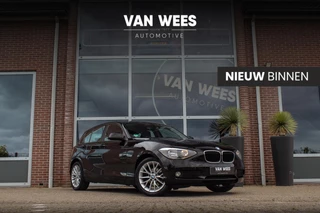 BMW 1-serie 116i Business | Sportstuur | Stoelverwarming | Radio Professional | Zichtpakket | PDC | Middenarmsteun | Regensensor | Mistlampen | 17 inch | Lichtsensor