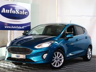 Hoofdafbeelding Ford Fiesta Ford Fiesta 1.0 EcoBoost Titanium NAVI Autom Camera PDC Lane/Park Ass.