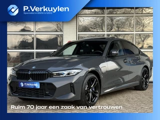 BMW 3-serie 320e M SPORT | 19 INCH VELGEN | PANORAMA | M SPORT REMMEN | TREKHAAK | ELEKTR. STOELEN MEMORY |