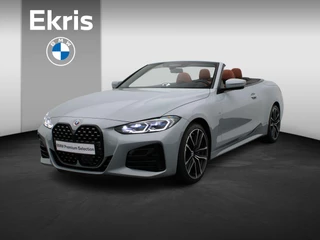Hoofdafbeelding BMW 4 Serie BMW 4 serie Cabrio M440i xDrive M Sportpakket | Laserlicht | Stuurwielverwarming | Nekverwarmer | Head-Up Display | 19"