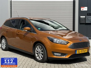 Ford Focus Wagon 1.0 Titanium speciale Oranje kleur