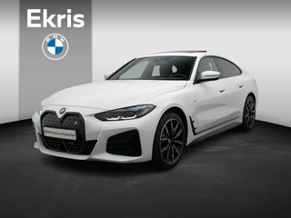BMW i4 eDrive40 M Sportpakket Pro | Stuurwielrand Verwarmd | Achteruitrijcamera | Schuifdak | DAB | HiFi | 19''