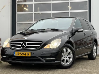 Hoofdafbeelding Mercedes-Benz R-Klasse Mercedes-Benz R-Klasse 300 CDI BlueEFFICIENCY 190pk | 7-persoons | Achteruitrijcamera | Bi-xenon koplampen | Cruise control | Lederen bekleding | Luchtvering | Parkeersensor voor en achter | Voorstoelen verwarmd | Dealer onderhouden!