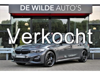 BMW 3 Serie Touring 330e M-sport 292pk Dravitgrijs Pano Harman/Kardon Head-up Laser Camera