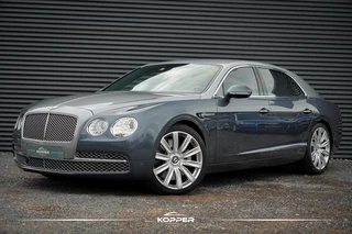 Hoofdafbeelding Bentley Flying Spur Bentley Flying Spur 6.0 W12 / Mulliner / NL 1e Eigenaar / 21'' / Two-Tone / Nieuwstaat / Volledige Bentley historie