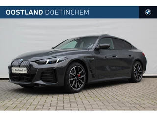 BMW i4 eDrive35 High Executive / Schuif-kanteldak / Trekhaak / M Adaptief onderstel / Comfort Access / Adaptieve LED / Harman Kardon / Live Cockpit Professional