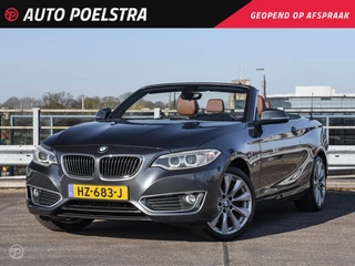 BMW 2-serie Cabrio 220i Luxury Navigatie Camera Bi-xenon Keyless Stoelverwarming Leder Sportstoelen Trekhaak 18"