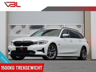 BMW 3-serie Touring 320e High Executive | Laser LED | Head-up | Sportstoelen |