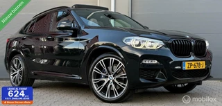 Hoofdafbeelding BMW X4 BMW X4 xDrive20i High Executive M-Sport Pano.dak/H&K/Leder/21"