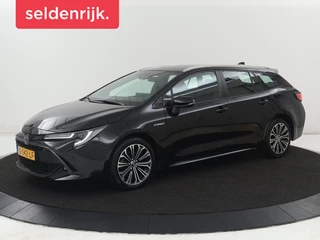 Hoofdafbeelding Toyota Corolla Toyota Corolla 1.8 Hybrid Business Intro | Head-Up |  Stoelverwarming | Adaptive cruise | Navigatie | Keyless | Full LED | Park Assist | Climate control | Bluetooth