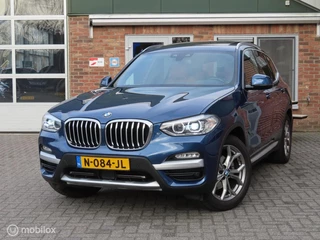 BMW X3 xDrive20i High Executive|Leder|Pano|Wegklapbare trekhaak|HUD|Camera|Zwarte Hemel.