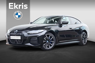 BMW i4 eDrive40 High Executive 84 kWh M Sport Pro / Glazen schuif-/kanteldak / Harman Kardon / Stoelverwarming / Camera / Comfort Access