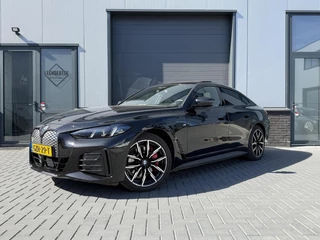 Hoofdafbeelding BMW i4 BMW i4 eDrive40 84 kwh M-Pro -Pano-Carbon-Fabrieksgarantie
