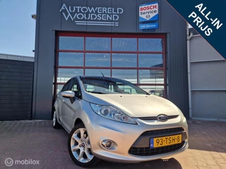 Ford Fiesta 1.25 Titanium 12 MND BOVAG GAR | LEER | CLIMA | STOELVERW | PDC | TREKHAAK | VERW VOORRUIT