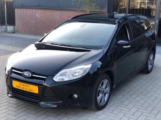 Hoofdafbeelding Ford Focus Ford Focus Wagon 1.6 EcoBoost Titanium NIEUWSTAAT NAVI CLIMA PDC LM VELGEN