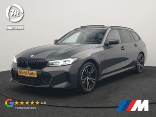 BMW 3 Serie Touring 330e M Sport FACELIFT PHEV 293pk Dealer O.H. | Dravitgray | Trekhaak Af Fabriek | Panodak | Head Up | Camera | Lederen Sportstoelen Verwarmd | Sfeerverlichting | Apple Carplay | Keyless | Blis | Cruise Control | Navigatie | DAB | Plug In Hybrid |