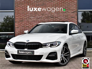 Hoofdafbeelding BMW 3 Serie BMW 3 Serie 320i M-Sport Pano 19inch Laser HiFi Shadowline