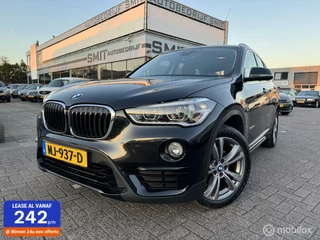 Hoofdafbeelding BMW X1 BMW X1 sDrive18i Centennial Exec. Sport/Nav/Trekhaak/NLAuto