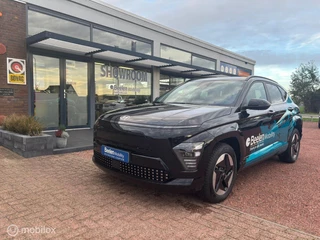 Hyundai Kona Comfort Smart 65.4 kWh | Warmtepomp| HUD| Stoel + stuur verwarm