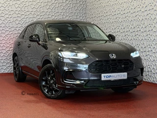 Hoofdafbeelding Honda ZR-V Honda ZR-V 2.0 e:HEV 184PK SPORT STOELVERW CAMERA CARPLAY ELEK.STOEL PDC